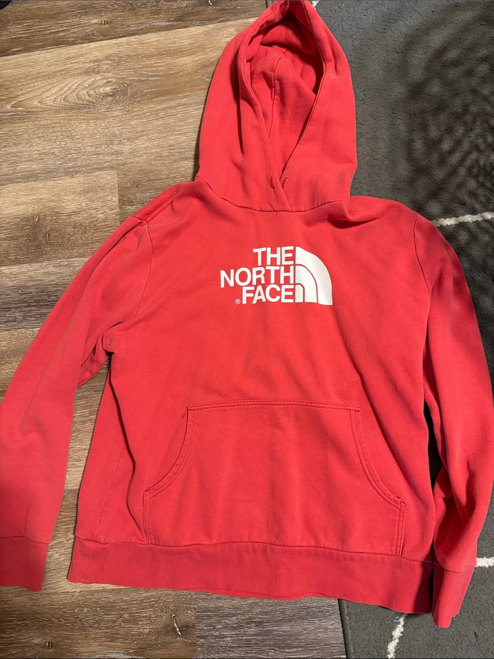 The North Face women’s pink Hoodie with White Logo
